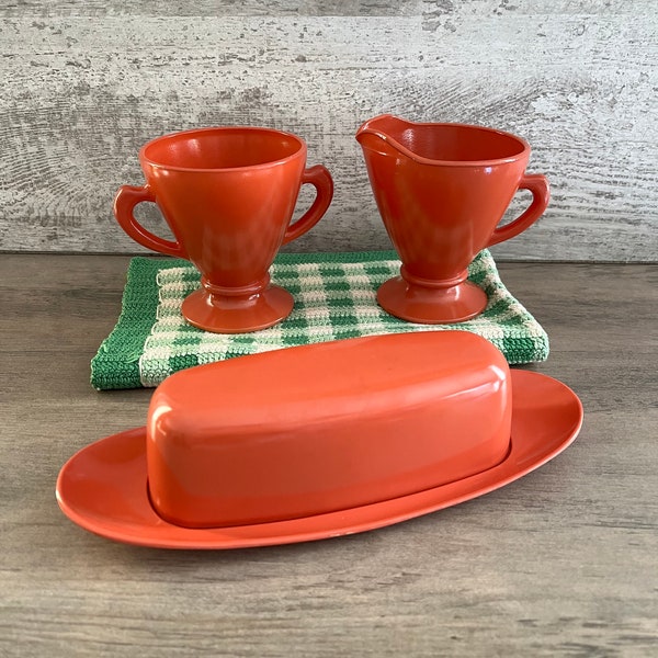 Vintage Hazel Atlas Milk Glass Sugar and Creamer Set. Matching Melmac Durawear Covered Butter Dish. Salmon Colored.  Made in USA. 1960’s.