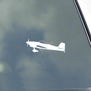 May include: White silhouette of a small airplane with a single propeller on a gray background.
