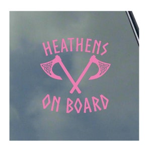 May include: Pink vinyl sticker with the text "HEATHENS ON BOARD" and two crossed axes with Celtic knot designs.