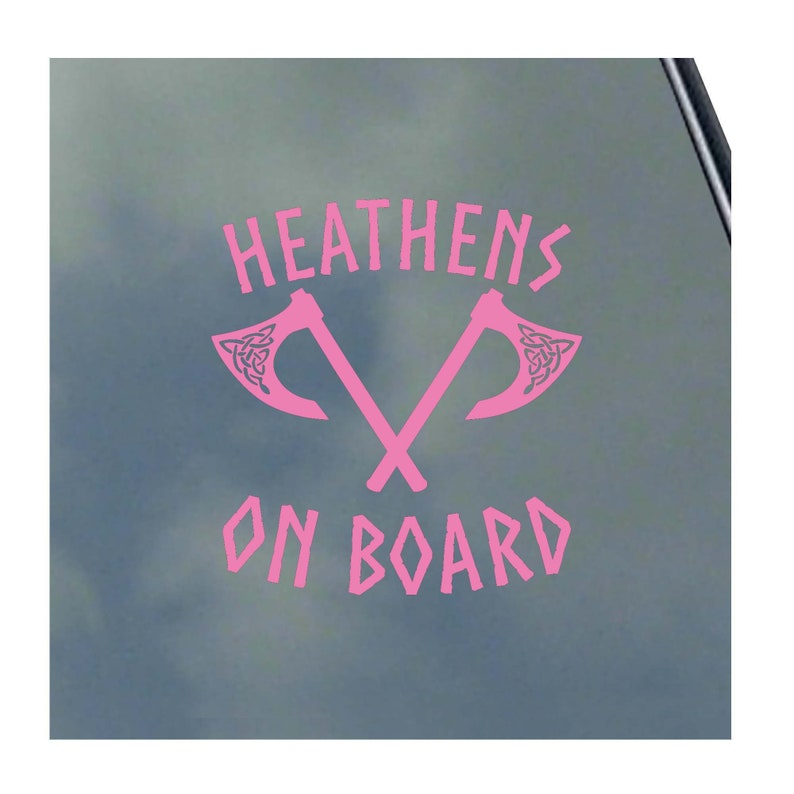 May include: Pink vinyl sticker with the text "HEATHENS ON BOARD" and two crossed axes with Celtic knot designs.