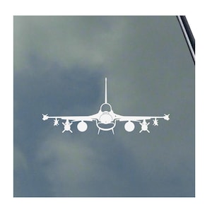 May include: A white silhouette of a fighter jet against a blue cloudy background.