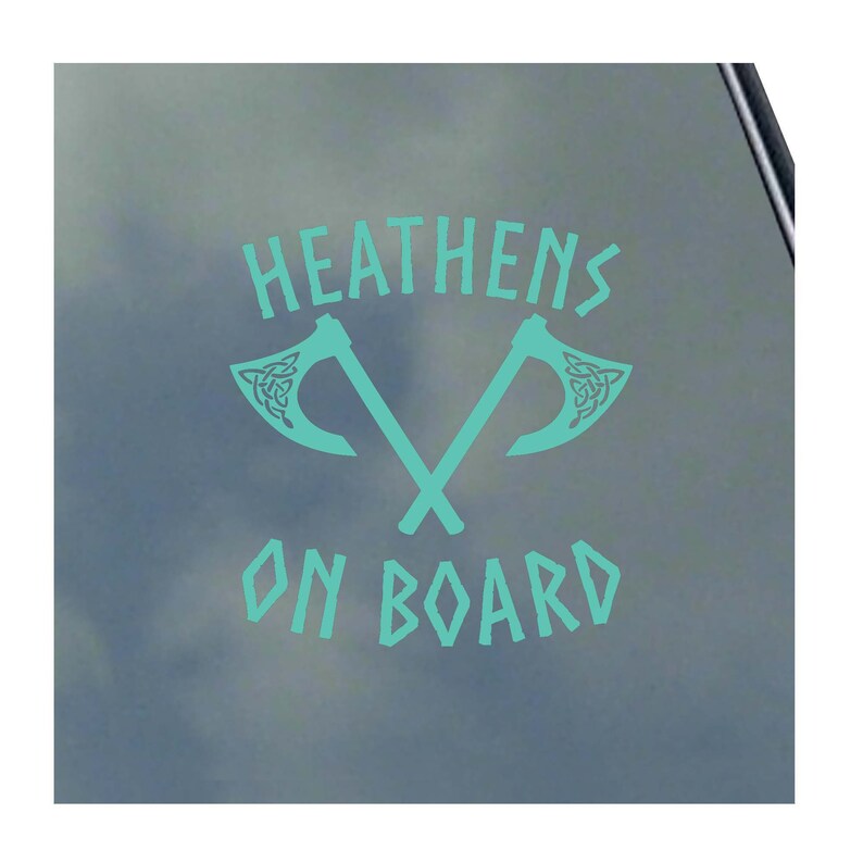 May include: Teal blue vinyl sticker with the text "HEATHENS ON BOARD" and two crossed axes with Celtic knot designs.