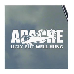 May include: White vinyl decal with a silhouette of an Apache helicopter and the text "APACHE UGLY BUT WELL HUNG".