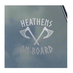 May include: A silver vinyl sticker with the text "HEATHENS ON BOARD" and two crossed axes with Celtic knot designs.