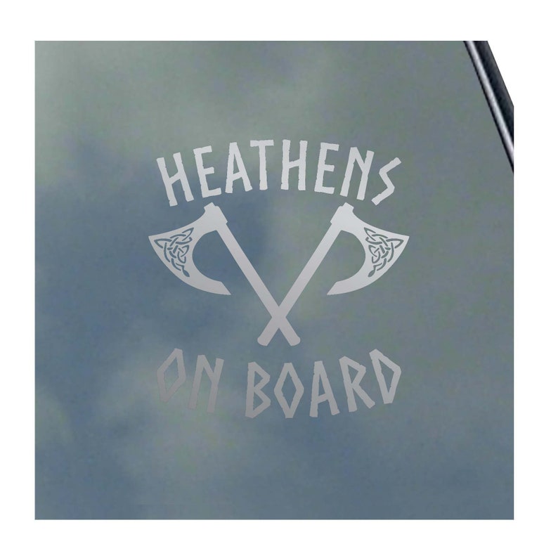 May include: A silver vinyl sticker with the text "HEATHENS ON BOARD" and two crossed axes with Celtic knot designs.