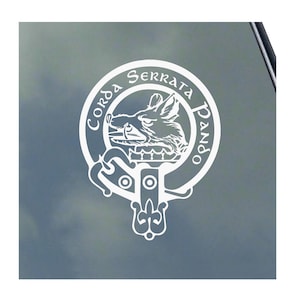 May include: White vinyl decal of a Scottish clan crest featuring a boar's head with the text "Corda Serrata Dando" around the crest.