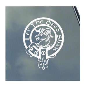 May include: White vinyl decal featuring a Scottish clan crest with a ram's head and the text "Let The Deed Shaw", a traditional Scottish motto.