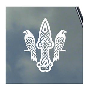 May include: White vinyl sticker with a Celtic knot design featuring two birds on either side of a central spear-like shape.