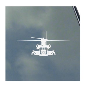 May include: A white silhouette of a helicopter, seen from the front. The image shows the helicopter's detailed body, two main rotors, and other components. The background is a gradient of grey and white.