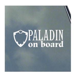 May include: White vinyl sticker with a stylized shield and the text "PALADIN on board".