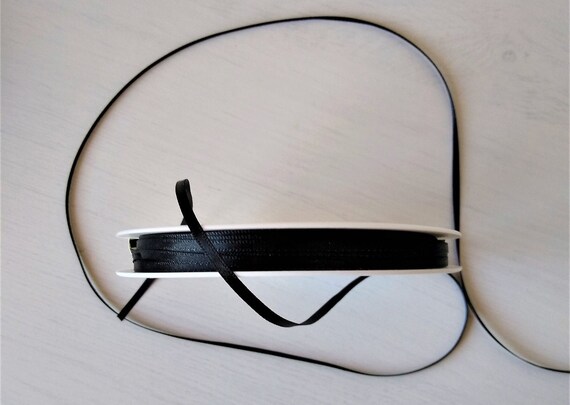 Thin black 2024 satin ribbon