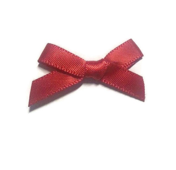 . Red 10 SMALL RIBBON BOWS
