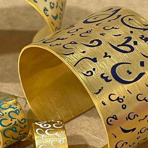Handmade enamel cuff bracelet with Arabic calligraphy letters