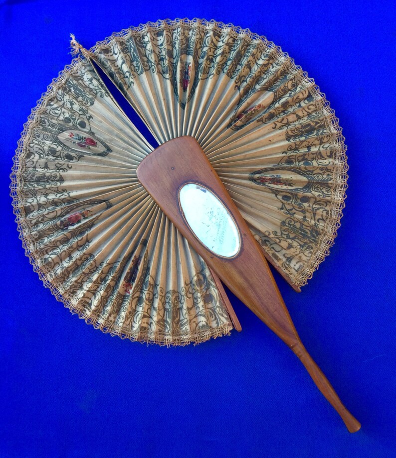 Late Victorian Ricardo Cockade Screen Flirting Fan with hand painted bird and bevelled oval mirror.
