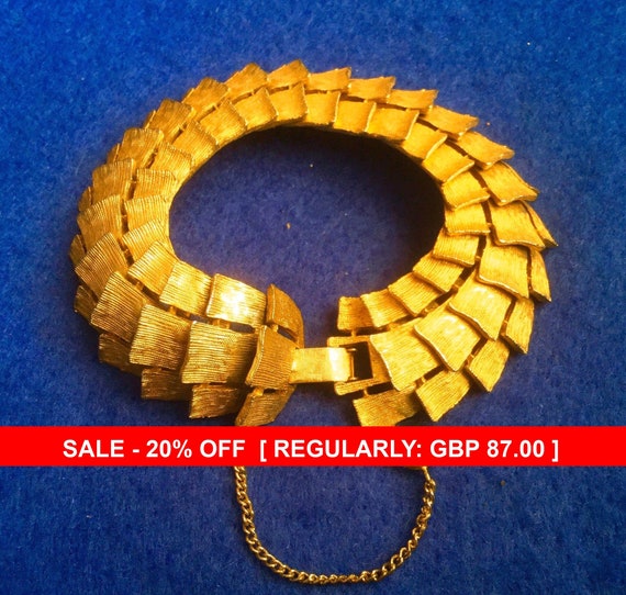 Articulated Gold tone Corocraft Bracelet