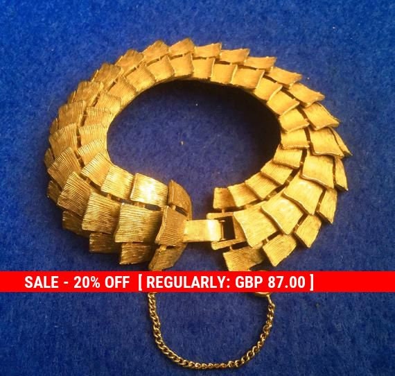 Articulated Gold tone Corocraft Bracelet
