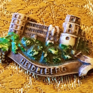1930s Celluloid Souvenir Brooch from Heidelberg with the Castle and a name banner