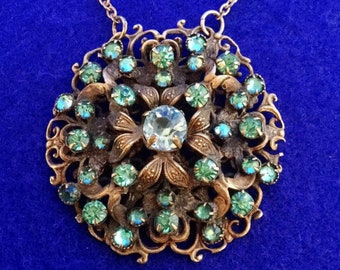 Fabulous 1920s Bohemian or Czechoslovakian Art Nouveau Brass Pendant with Claw Set Faux Aquamarines in Floral Motif