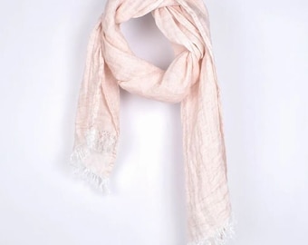 May include: A pale pink linen scarf with a fringed edge.