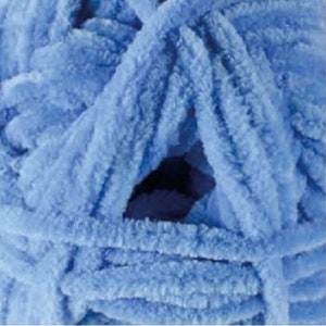May include: A skein of light blue fuzzy yarn. The yarn is soft and fluffy, and it is perfect for making blankets, scarves, and other cosy items.