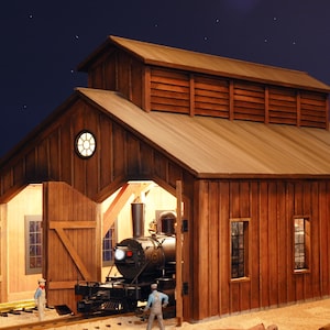 May include: A detailed model of a wooden train depot at night, with a steam train inside and another outside. The scene is illuminated by interior lights and a full moon in the dark blue sky. Two figures stand near the trains.