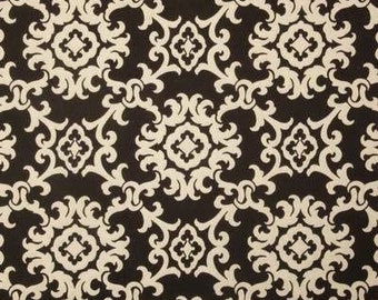 May include: Black fabric with a white damask pattern. The pattern features intricate swirls and floral designs.