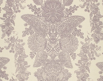 May include: A white background with a repeating pattern of a large, intricate, purple floral design. The design is made up of many small, detailed flowers and leaves.