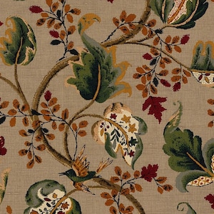 May include: A beige fabric with a repeating pattern of stylized green, brown, and red leaves and branches. A stylized bird with brown and gold wings is perched on a branch.