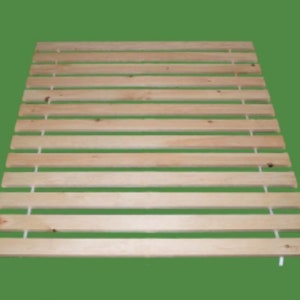 May include: A natural wood slatted bed frame with white string supports. The frame is made of unfinished wood and has a rectangular shape.