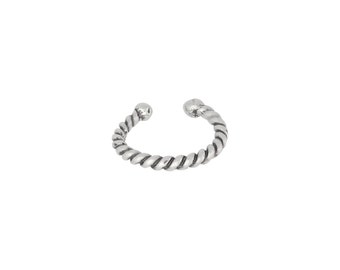 May include: Silver twisted ring with rounded ends.