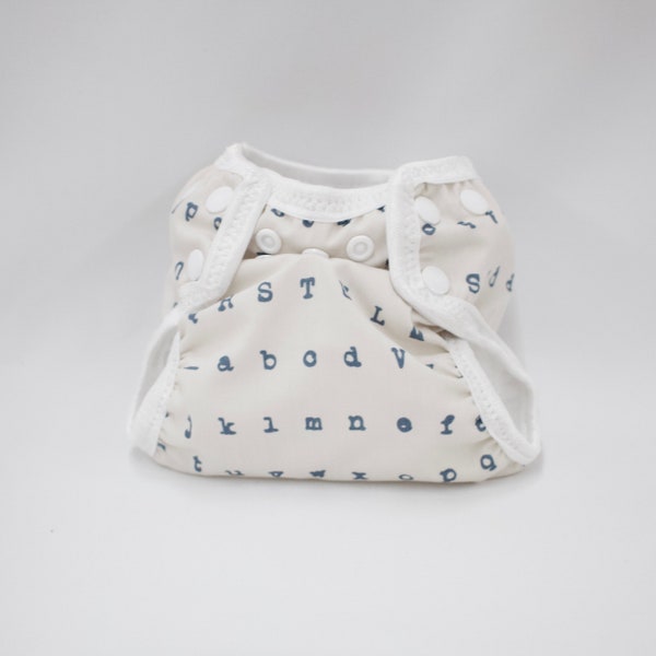 Typewriter Print Newborn Cloth Diaper with umbilical cord snap