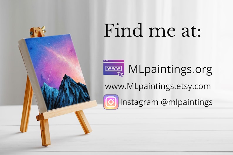 May include: A small painting on a wooden easel depicts a mountain range with a pink and purple sky. The painting is titled "Find me at: MLpaintings.org, www.MLpaintings.etsy.com, Instagram @mlpaintings".