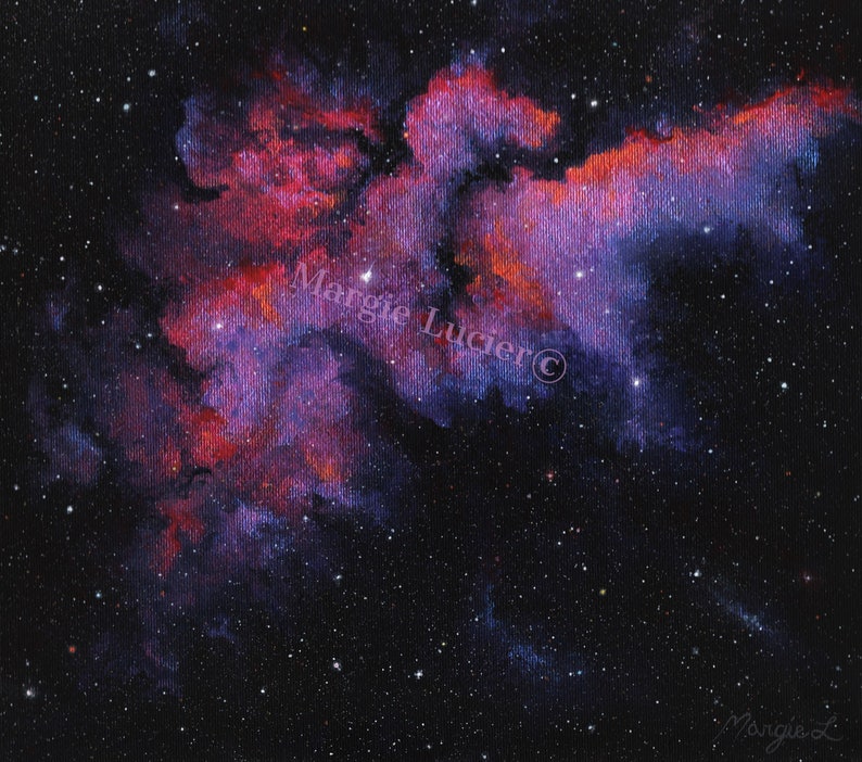 May include: A painting of a nebula in space with red, pink, and purple hues. The nebula is surrounded by a dark blue background with white stars. The artist's signature, "Margie Lucier", is visible in the lower right corner.