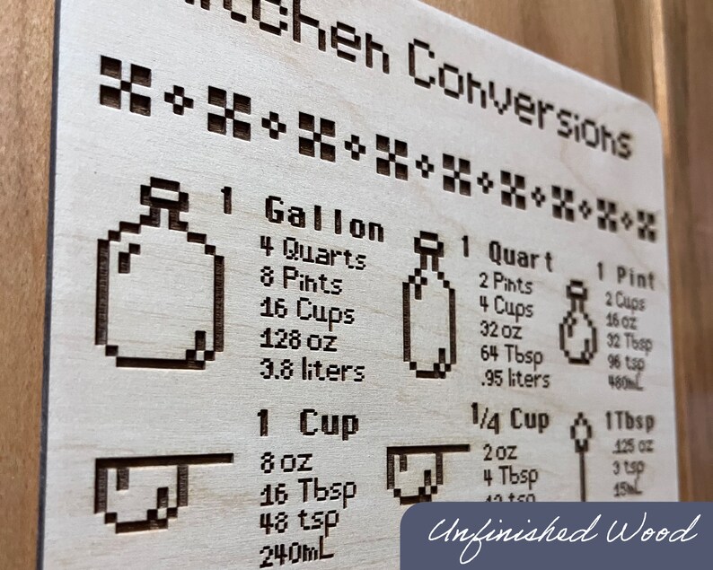May include: Wooden kitchen conversion chart with engraved text and pixelated illustrations. Includes measurements for gallons, quarts, pints, cups, and tablespoons. The text "Unfinished Wood" is also visible.