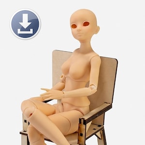 May include: A nude-coloured articulated doll with a bald head and open eye sockets, seated in a wooden chair. The doll is posed with bent legs and arms, and the chair has a simple, geometric design. A blue and white download icon is in the upper left corner.