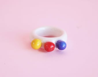 BUBBLE RING Red, Blue, Yellow Ornamental Handmade Porcelain Design