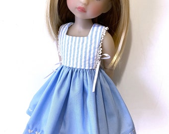 Blue and white seersucker and cotton sundress with narrow embroidered lace trim and side bows . Made to fit 15" RRFF dolls