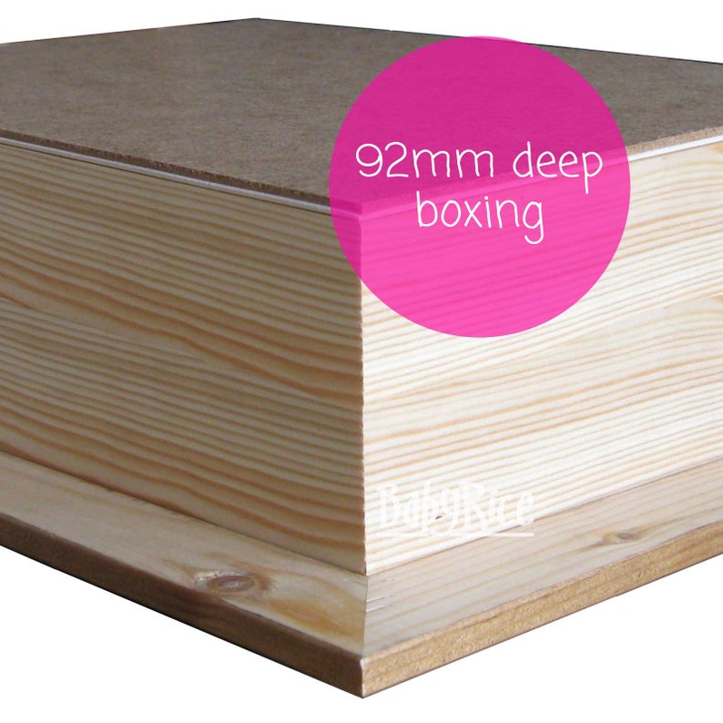 May include: Close-up of a wooden box with a 92mm deep boxing label. The box is made of light wood with a natural finish. The box is shown from the side, with the top edge of the box visible.