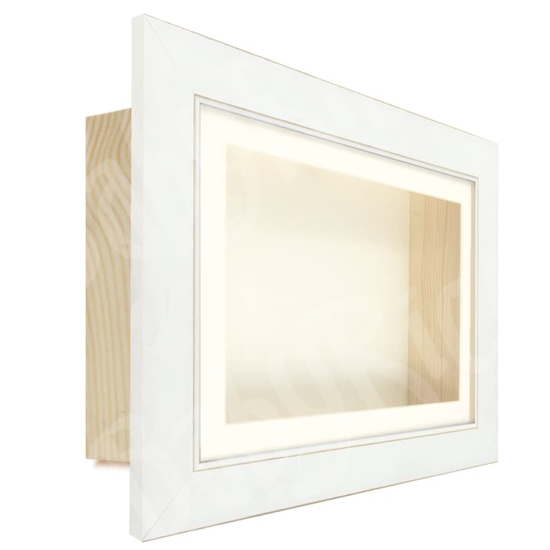 May include: White shadow box frame with a white mount and a clear glass front. The frame is made of wood and has a simple design.
