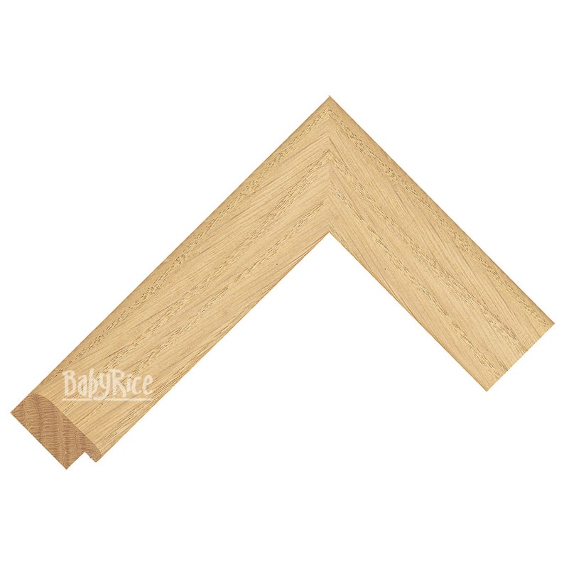 Puede incluir: Primer plano de la esquina de un marco de imagen de madera clara. El marco tiene un dise&ntilde;o simple de borde recto.