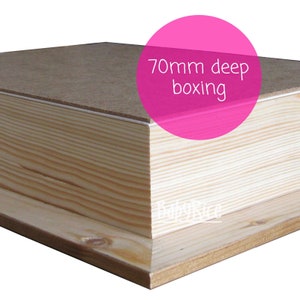May include: A close-up of the corner of a wooden box with a 70mm deep boxing. The box is made of light wood with a natural finish.