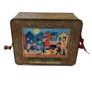 Boîte à musique vintage en métal doré Mattel Tippee-Tim Dancing Monkey, 26 x 21 cm
