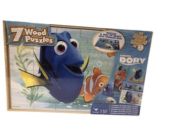 Rompecabezas de madera de Disney Pixar Buscando a Dory (paquete de 7) con caja de almacenamiento. Juguete para niños.