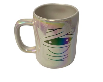 RAE Dunn Artisan Collection Iridescent Mummy Eye Haunted Halloween Mug Cup 3W 5H