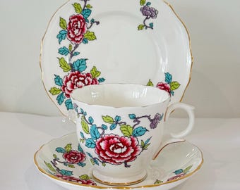 Red and blue Mums Floral Crown Staffordshire teacup, saucer and side plate 1950s