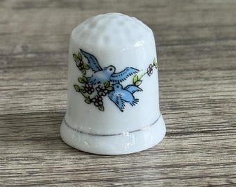Vintage Porcelain Thimble with Blue Bird Design – Collectible Sewing Souvenir