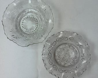 Pair of mismatched ruffled edged clear glass dishes c1940s