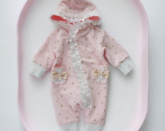 Girls pastel pink merino wool double-layered jumpsuit with golden hearts, luxurious lace, and Swarovski crystals. Newborn/baby girl overall