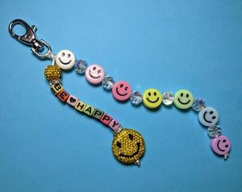 Ciondolo per borsa con faccina sorridente e perline arcobaleno, clip per borsa con strass per zaino
