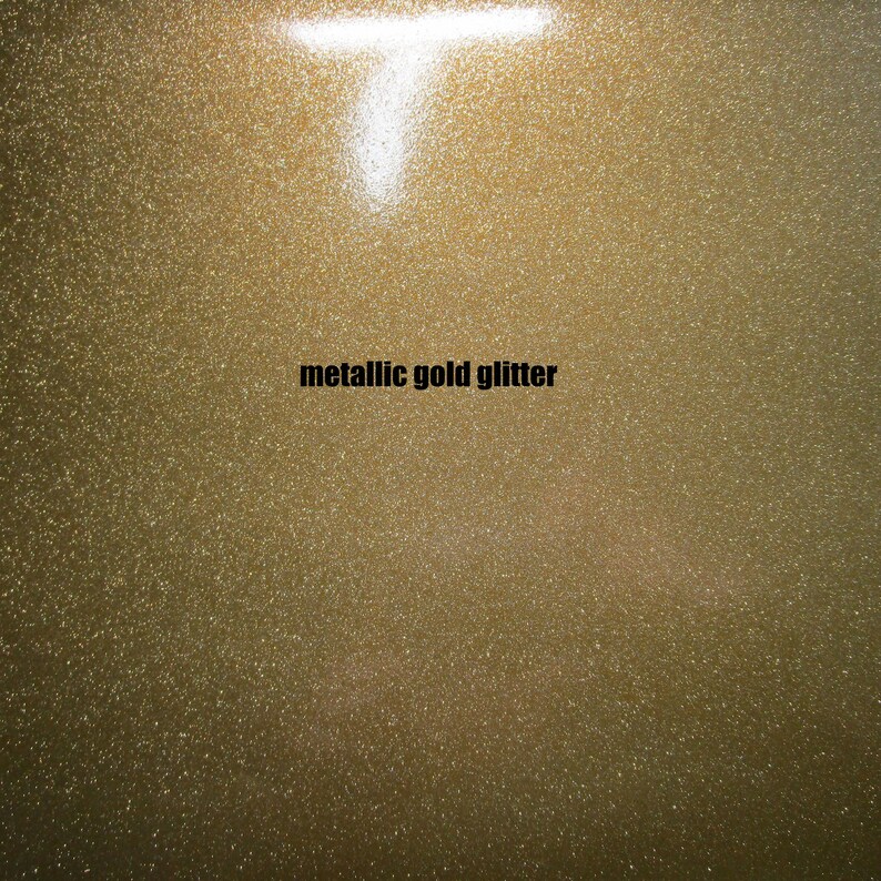 May include: Metallic gold glitter with a fine, even texture. The glitter is a light gold color and has a subtle shimmer.